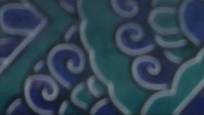 La hija menor de los Obama, Sasha, se ve aburrida junto a la primera dama en la ciudad de Xi'an.