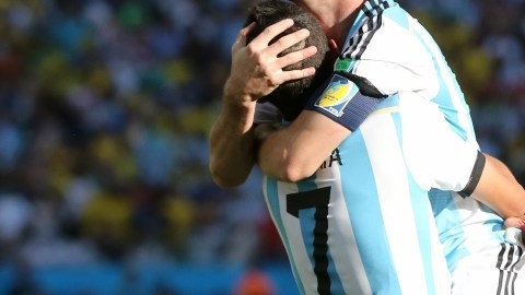 SAO PAULO, BRAZIL - JULY 01:  Angel Di Maria of Argentina celebrates scoring with Lionel Messi of Argentina during the 2014 FIFA World Cup Brazil Round of 16 match between Argentina and Switzerland at The Arena de Sao Paulo on July 01, 2014 in Sao Paulo, Brazil. (Photo by Ian MacNicol/Getty Images)
