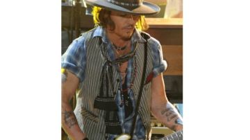 Gracias a su amistad con los integrantes de Aerosmith, Johnny Depp pudo tocar en su concierto.