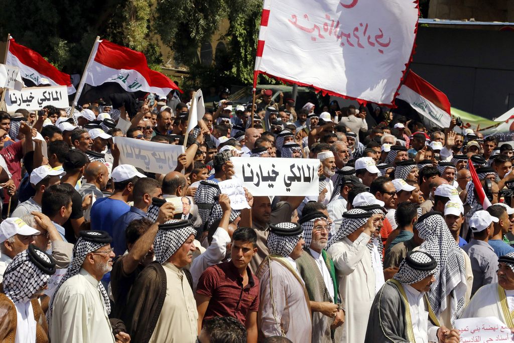 Partidarios del Primer Ministro de Irak, Nuri al-Maliki, durante una manifestación este sábado en el centro de Bagdad.