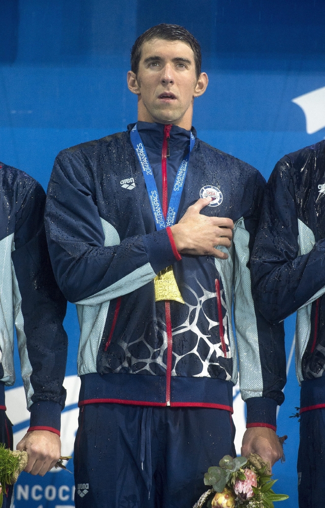 Michael Phelps volvió a lo más alto del podio ayer