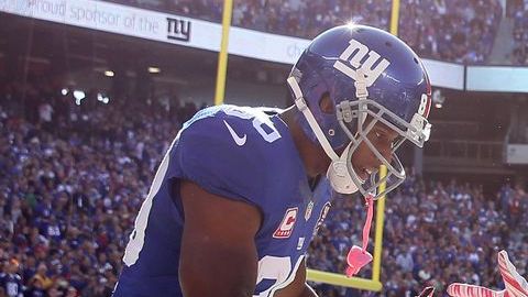 Victor Cruz (izq.) celebra con Odell Beckham Jr. el primer touchdown en la carrera del novato.