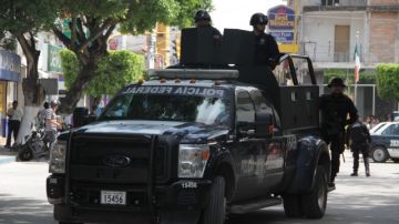 La policía estatal y federal patrullan constantemente las calles de Iguala.