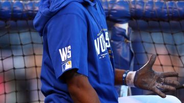 KANSAS CITY, MO - OCTOBER 21:  Alcides Escobar #2 of the Kansas City Royals looks on during batting practice before Game One of the 2014 World Series against the San Francisco Giants at Kauffman Stadium on October 21, 2014 in Kansas City, Missouri.  (Photo by Elsa/Getty Images)