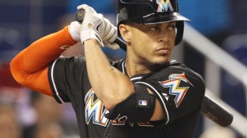 Giancarlo Stanton #27 of the Miami Marlins bats against the Atanta Braves during the first inning at Marlins Park on September 6, 2014 in Miami, Florida.