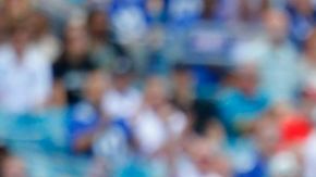 Kevin Ogletree #15 de los New York Giants detenido por Sherrod Martin de los Jacksonville Jaguars.