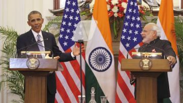 Obama y el primer ministrio Narendra Modi en el primer día de actividades.