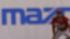 Elián Herrera, quien aquí regresa a la primera base en una revirada del pitcher, fue el héroe dominicano.