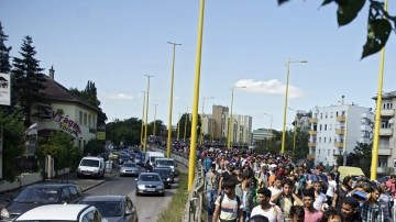 Refugiados camino a Austria.