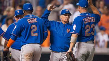 El manager Terry Collins (centro) ha rearmado a los Mets desde la llegada del sluger cubano Yoenis Céspedes / Getty Images