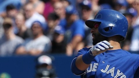 TORONTO, CANADA - SEPTEMBER 5: Jose Bautista #19 of the Toronto Blue Jays hits an RBI double in the third inning during MLB game action against the Baltimore Orioles on September 5, 2015 at Rogers Centre in Toronto, Ontario, Canada. (Photo by Tom Szczerbowski/Getty Images)
