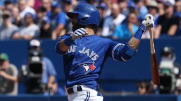 TORONTO, CANADA - SEPTEMBER 5: Jose Bautista #19 of the Toronto Blue Jays hits an RBI double in the third inning during MLB game action against the Baltimore Orioles on September 5, 2015 at Rogers Centre in Toronto, Ontario, Canada. (Photo by Tom Szczerbowski/Getty Images)