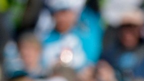 Cam Newton, estrella de los Panthers, celebra durante el partido de playoffs contra Seattle.