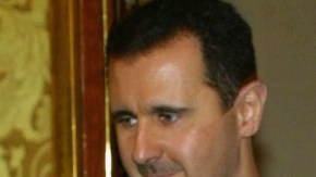 Russian President Vladimir Putin (R) receives Syrian President Bashar al-Assad (L)