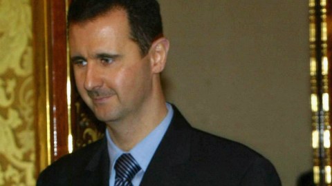 Russian President Vladimir Putin (R) receives Syrian President Bashar al-Assad (L)