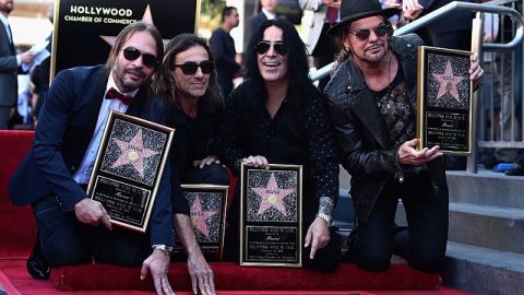 Los integrantes de Maná, de izq. a der., Sergio Vallín, Juan Calleros, Alex González y Fher Olvera, festejando su ansiada estrella en Hollywood, California.