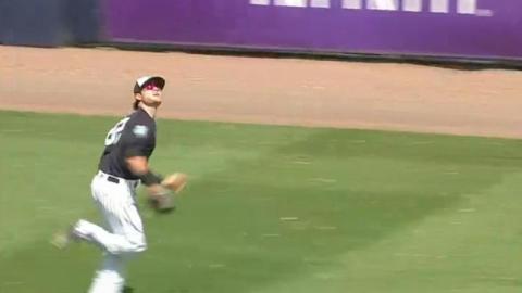 Ben Gamel en su carrera para atrapar lo que era un seguro extrabase.