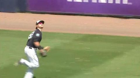 Ben Gamel en su carrera para atrapar lo que era un seguro extrabase.