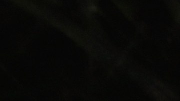 LeBron James trata de encestar ante la defensa de Brook López.