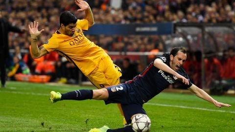 "Amigos y rivales": Luis Suárez y Diego Godín.