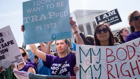 WASHINGTON, DC - JUNE 27:  Pro-choice activists celebrate on the steps of the United States Supreme Court on June 27, 2016 in Washington, DC. In a 5-3 decision, the U.S. Supreme Court struck down one of the nation's toughest restrictions on abortion, a Texas law that women's groups said would have forced more than three-quarters of the state's clinics to close. (Photo by Pete Marovich/Getty Images)