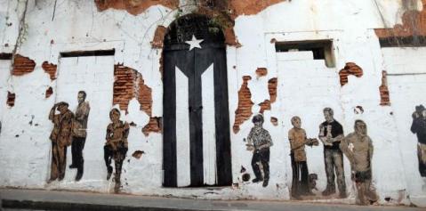 Algunos hicieron una analogía de la puerta con la "muerte" del Estado Libre Asociado.