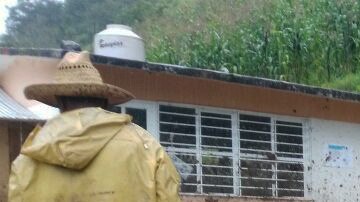 Daños por las intensas lluvias que dejó a su paso la tormenta tropical Earl en la comunidad de Tamazolapa, en Veracruz .