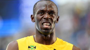 Usain Bolt cumplirá con el trámite de las semifinales de los 200 m.