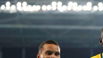 De Grasse, Bolt y Lemaitre en el podio de los 200 m.