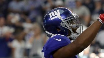 Víctor Cruz, receptor de los NY Giants, celebra con su sello propio el touchdown que marcó la diferencia el domingo para vencer a los Cowboys de Dallas.