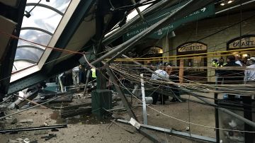 HOBOKEN, NJ - SEPTEMBER 29: The roof collapse after a NJ Transit train crashed in to the platform at the Hoboken Terminal September 29, 2016 in Hoboken, New Jersey. New Jersey emergency's management system is reporting more than 100 people were injured in the crash.(Photo by Pancho Bernasconi/Getty Images)