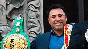 Oscar De La Hoya y Canelo Álvarez.