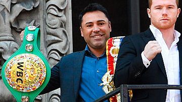 Oscar De La Hoya y Canelo Álvarez.
