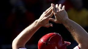 WASHINGTON, DC - OCTOBER 9: Jose Lobaton #59 of the Washington Nationals celebrates with teammates Danny Espinosa #8, Tanner Roark #57, and Daniel Murphy #20 after hitting a three run home run against the Los Angeles Dodgers in the fourth inning during game two of the National League Division Series at Nationals Park on October 9, 2016 in Washington, DC. (Photo by Patrick Smith/Getty Images)