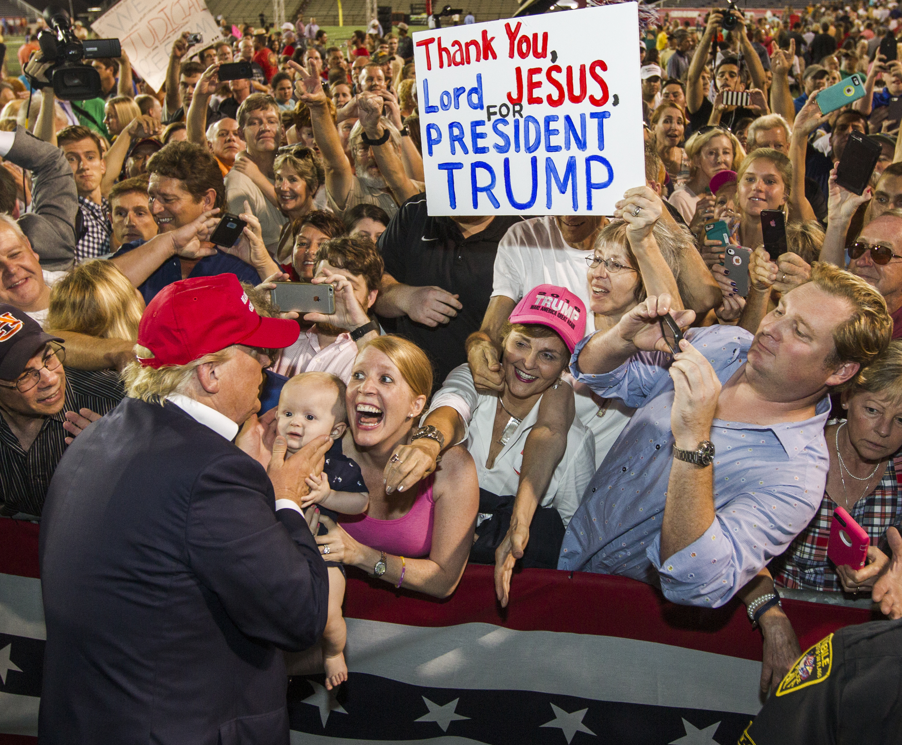 MOBILE, AL- AUGUST 21: Republican presidential candidate Donald Trump greets supporters after his rally at Ladd-Peebles Stadium on August 21, 2015 in Mobile, Alabama. The Trump campaign moved tonight's rally to a larger stadium to accommodate demand. (Photo by Mark Wallheiser/Getty Images)