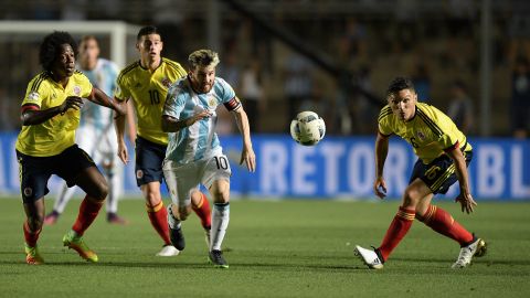 Argentina's Lionel Messi (3-L) and Colombia's Carlos Sanchez (L), James Rodriguez (2-L) and Daniel Torres eye the ball during their 2018 FIFA World Cup qualifier football match in San Juan, Argentina, on November 15, 2016. / AFP / Juan Mabromata (Photo credit should read JUAN MABROMATA/AFP/Getty Images)