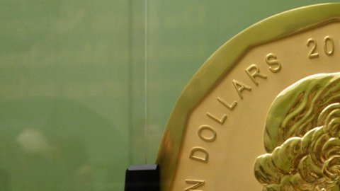 moneda oro