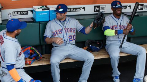 SAN FRANCISCO, CA - AUGUST 21: Rene Rivera #44 of the New York Mets, Neil Walker #20 and Jose Reyes #7 sit in the dugout before the game against the San Francisco Giants at AT&T Park on August 21, 2016 in San Francisco, California.  The New York Mets defeated the San Francisco Giants 2-0. (Photo by Jason O. Watson/Getty Images)