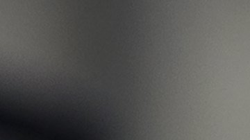 El candidato socioliberal a las elecciones presidenciales francesas, Emmanuel Macron (c), en el homenaje al policía Xavier Jugelé, asesinado en un atentado yihadista en París.