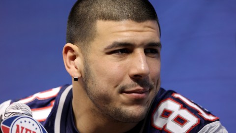 INDIANAPOLIS, IN - JANUARY 31: Aaron Hernandez #81 of the New England Patriots answers questions from the media during Media Day ahead of Super Bowl XLVI against the New York Giants at Lucas Oil Stadium on January 31, 2012 in Indianapolis, Indiana. (Photo by Michael Heiman/Getty Images)