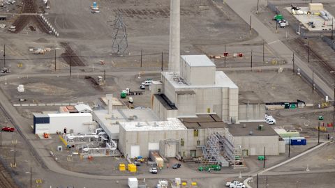 Workers demolish a decommissioned nuclear reactor during the cleanup operations at the Western hemisphere's most contaminated nuclear site in Hanford, Washington state on March 21, 2011. It sounded like a good idea at the time. Racing to build an atomic bomb during World War II, US authorities sealed off a pristine desert and created the first-ever plutonium reactor. Sixty-eight years later, Hanford remains off limits. Not because of weapons work, which has long ago ceased, but because it is the Western hemisphere's most contaminated nuclear site with 53 million gallons (200 million liters) of radioactive waste stored in aging tanks. With billions of dollars a year invested in cleanup, there is little palpable fear among residents here in the northwestern state of Washington. Some 12,000 people work at Hanford, which at 586 square miles (1,518 square kilometers) is twice the size of Singapore. AFP PHOTO/Mark RALSTON (Photo credit should read MARK RALSTON/AFP/Getty Images)