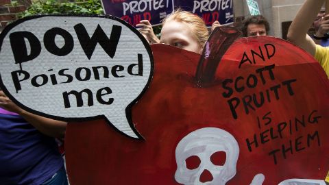 NEW YORK, NY - JUNE 20:  Environmental activists protest outside of the Harvard Club where Environmental Protection Agency (EPA) Administrator Scott Pruitt was scheduled to speak, June 20, 2017 in New York City. Pruitt abruptly cancelled his appearance, where he was supposed to discuss the United States' environmental role in the world following the decision to withdraw the United States from the Paris Climate Accord. (Photo by Drew Angerer/Getty Images)