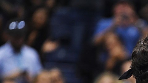 Del Potro y Federer se saludan al final del partido.