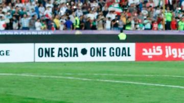 Los jugadores de Siria rezan al final del partido. ATTA KENARE/AFP/Getty Images