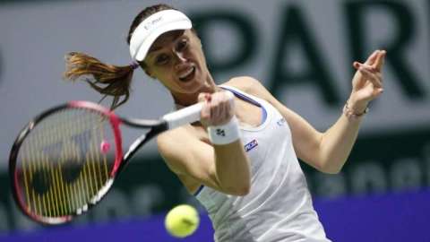 La suiza Martina Hingis se retiró definitivamente del tenis luego de ser eliminada del torneo de dobles de Singapur. (Foto: EFE/EPA/WALLACE WOON)