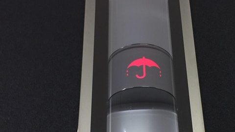 Simbolo de paraguas en elevador