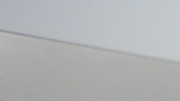 Peluquera Candida Vázquez trabajando en el salón Piscis en la Avenida Nagle en Manhattan.