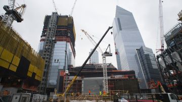 Construction cranes tower over the large-scale redevelopment program, Hudson Yards, February 7, 2017 in New York.  / AFP / DON EMMERT        (Photo credit should read DON EMMERT/AFP/Getty Images)