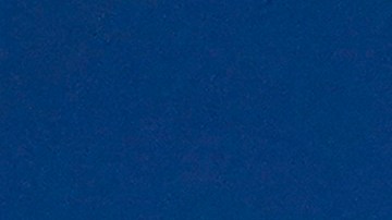 Nadal devuelve un servicio de Pospisil.