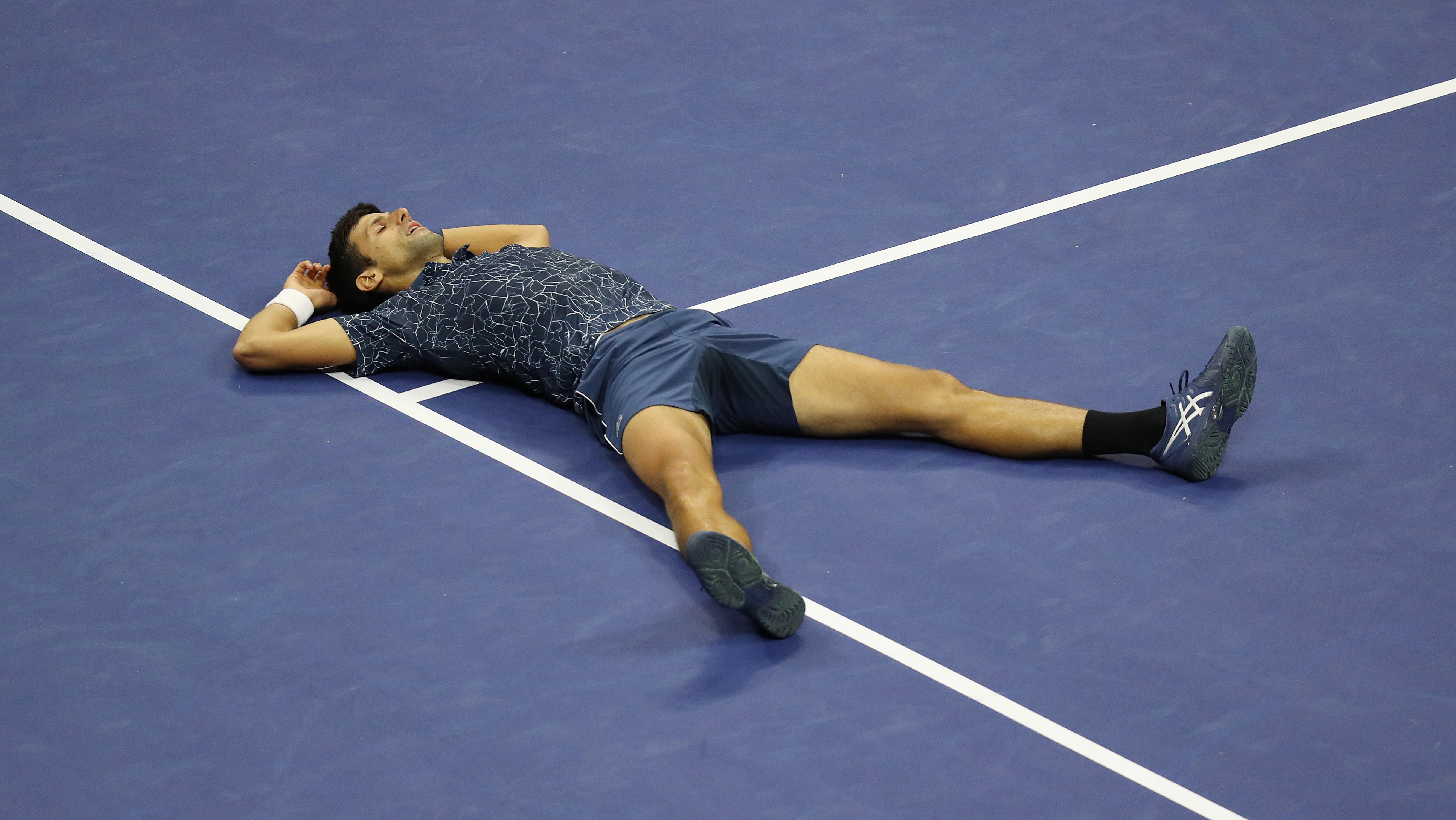 Djokovic se lanzó al suelo tras el último punto del partido. / Foto: EFE